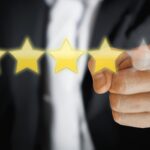 star reviews with finger pointing on the fifth star