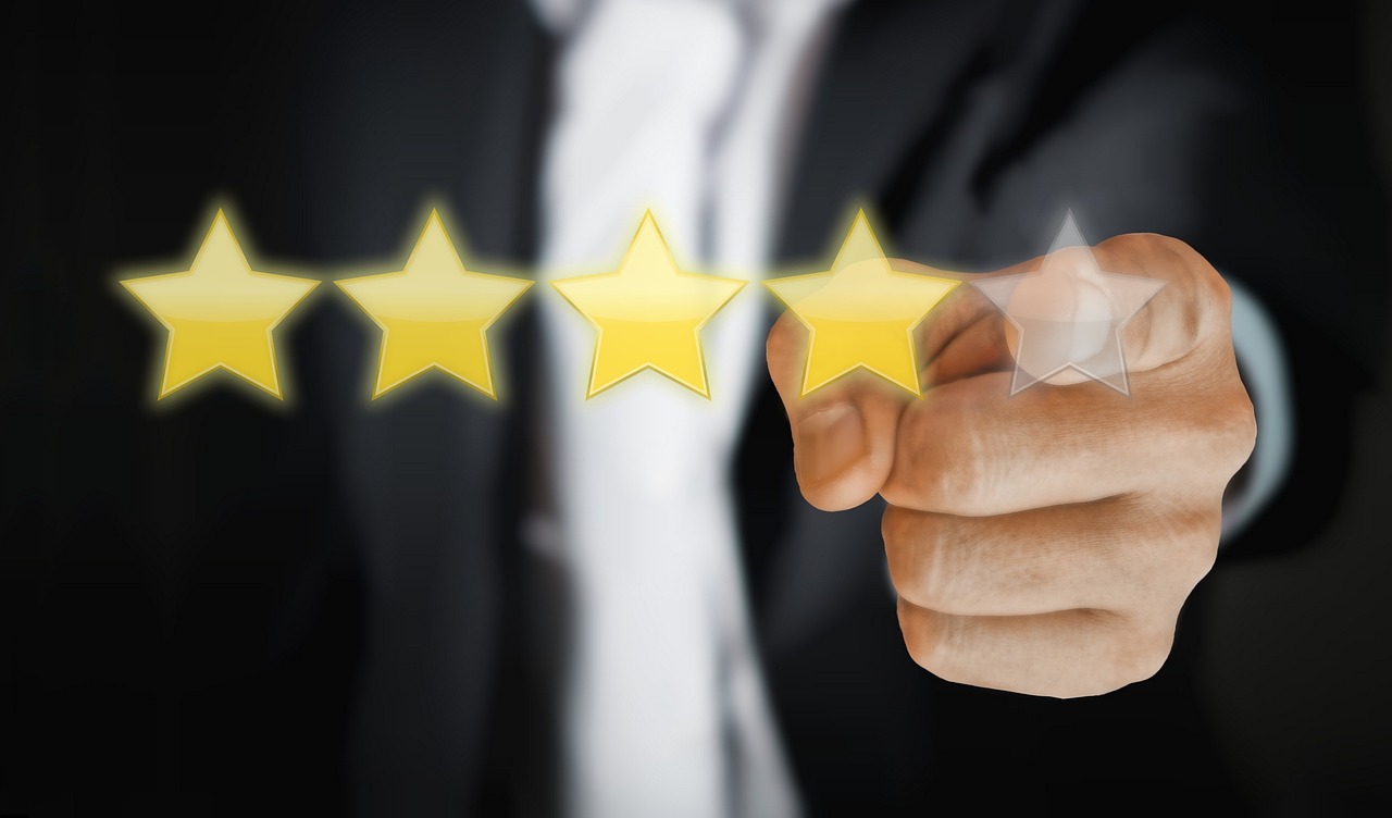 star reviews with finger pointing on the fifth star